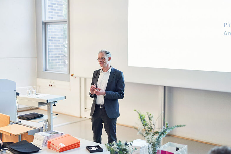 One person gives a lecture at the exhibition/graduation ceremony at the Faculty of Architecture