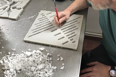 Stripping the slabs in the concrete laboratory