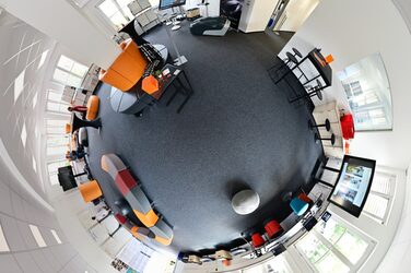 Little Planet photo at IDiAL with exhibits set up.