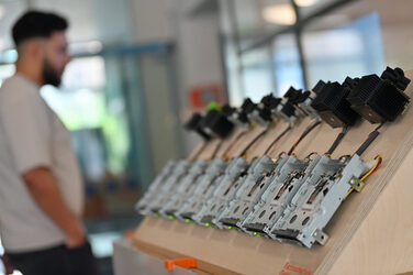 A person looks at technical devices