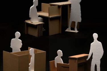 Collage shows three student models of space-creating desks made of cardboard against a black background.