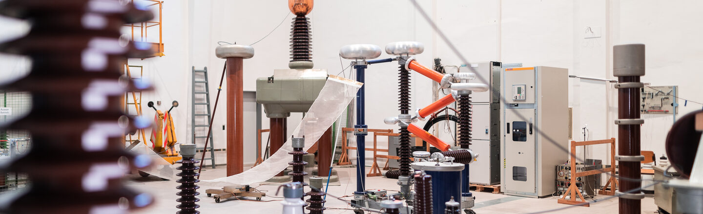 Photograph of the high-voltage laboratory with a wide range of laboratory equipment. __