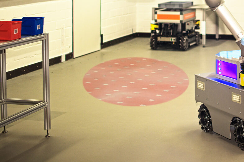 Picture of the transmitting and receiving units in the floor of the robot laboratory__Picture of the transmitting and receiving units in the floor of the robot laboratory