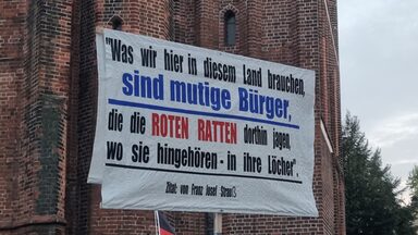 Poster at an AfD rally in Cottbus
