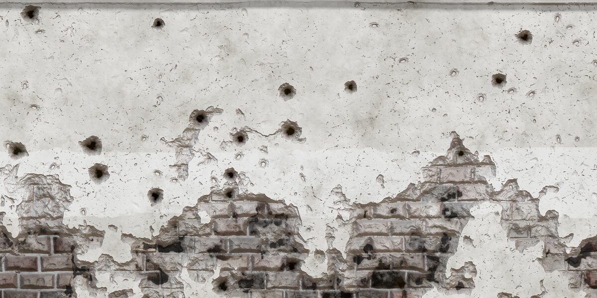 Wall with bullet holes