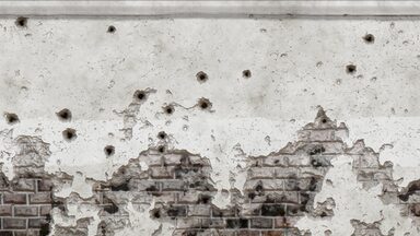 Wall with bullet holes