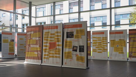 Impressions of the exhibition "75 years of social work at the Dortmund location". You can see some of the charts exhibited in the picture in the Kostbar.