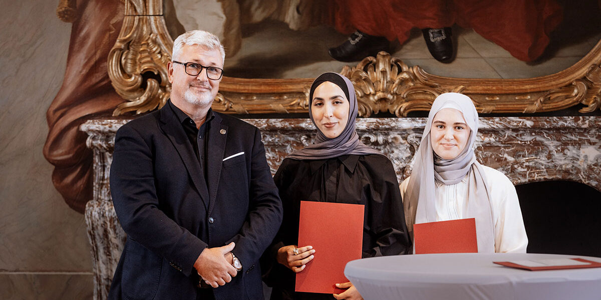 Students Sude Baysal and Palwascha Raschid at the award ceremony.