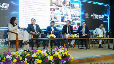 Several people sit on a podium