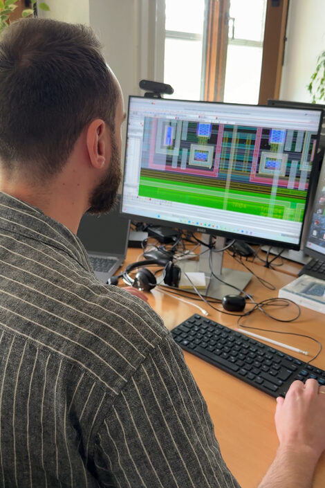 One person works on the computer