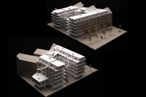 Architectural model, which is pulled apart in the middle to provide a view of the inner building structure and the covered inner courtyard.