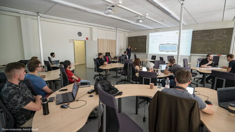 Students in an event room at the Summer School 2019